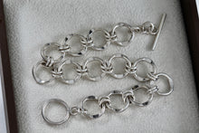 Load image into Gallery viewer, Sterling Silver Interlocking Wavy Circle Links Toggle 7.5" Bracelet