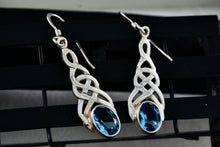 Load image into Gallery viewer, Sterling Silver Oval Blue Topaz Celtic Knot Dangle Hook Earrings