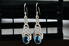Load image into Gallery viewer, Sterling Silver Oval Blue Topaz Celtic Knot Dangle Hook Earrings