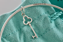 Load image into Gallery viewer, Tiffany & Co. Silver Small Trefoil Key Dangle Bangle Bracelet *Custom*