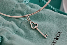 Load image into Gallery viewer, Tiffany & Co. Silver Small Trefoil Key Dangle Bangle Bracelet *Custom*