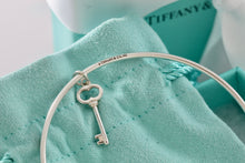 Load image into Gallery viewer, Tiffany & Co. Silver Small Oval Key Dangle Bangle Bracelet *Custom*