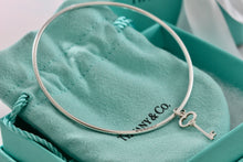 Load image into Gallery viewer, Tiffany & Co. Silver Small Oval Key Dangle Bangle Bracelet *Custom*
