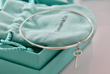 Load image into Gallery viewer, Tiffany & Co. Silver Small Oval Key Dangle Bangle Bracelet *Custom*