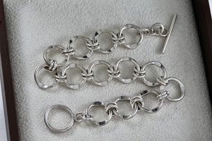 Sterling Silver Interlocking Wavy Circle Links Toggle 7.5" Bracelet