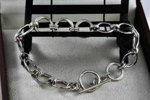 Sterling Silver Interlocking Wavy Circle Links Toggle 7.5" Bracelet