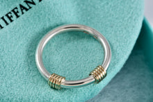 Load image into Gallery viewer, Tiffany &amp; Co. 18K Gold &amp; Silver Double Coil Wrap Narrow Band Ring Size 7
