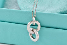 Load image into Gallery viewer, Tiffany &amp; Co. Small Silver Dangling Interlocking Circles Pendant Necklace
