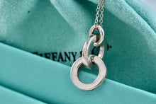 Load image into Gallery viewer, Tiffany &amp; Co. Small Silver Dangling Interlocking Circles Pendant Necklace
