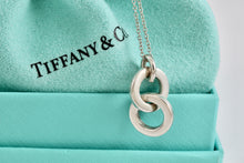 Load image into Gallery viewer, Tiffany &amp; Co. Small Silver Dangling Interlocking Circles Pendant Necklace
