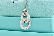 Load image into Gallery viewer, Tiffany &amp; Co. Small Silver Dangling Interlocking Circles Pendant Necklace
