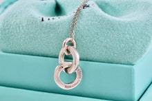 Load image into Gallery viewer, Tiffany &amp; Co. Small Silver Dangling Interlocking Circles Pendant Necklace
