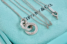 Load image into Gallery viewer, Tiffany &amp; Co. Small Silver Dangling Interlocking Circles Pendant Necklace
