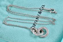 Load image into Gallery viewer, Tiffany &amp; Co. Small Silver Dangling Interlocking Circles Pendant Necklace
