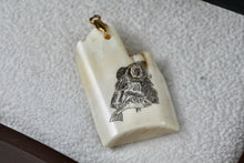 Load image into Gallery viewer, Bear &amp; Fish Engraved Bone Fragment 1.25&quot; Pendant
