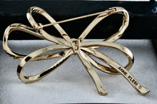 Load image into Gallery viewer, Anne Klein Gold Tone Rhinestone Ribbon Brooch
