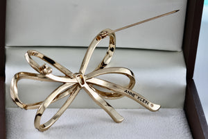 Anne Klein Gold Tone Rhinestone Ribbon Brooch