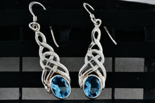 Load image into Gallery viewer, Sterling Silver Oval Blue Topaz Celtic Knot Dangle Hook Earrings
