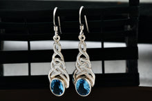 Load image into Gallery viewer, Sterling Silver Oval Blue Topaz Celtic Knot Dangle Hook Earrings
