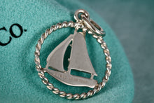 Load image into Gallery viewer, Tiffany &amp; Co. Silver Twist Sailboat Charm Pendant
