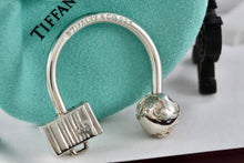 Load image into Gallery viewer, Tiffany &amp; Co. Silver World Globe &amp; Travel NYC USA Suitcase Horseshoe Keychain
