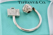 Load image into Gallery viewer, Tiffany &amp; Co. Silver World Globe &amp; Travel NYC USA Suitcase Horseshoe Keychain
