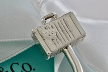 Load image into Gallery viewer, Tiffany &amp; Co. Silver World Globe &amp; Travel NYC USA Suitcase Horseshoe Keychain
