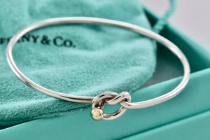 Tiffany & Co. Vintage 14kt. Gold Trim & Silver Love Knot Hook Bangle Bracelet