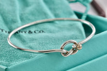 Load image into Gallery viewer, Tiffany &amp; Co. Vintage 14kt. Gold Trim &amp; Silver Love Knot Hook Bangle Bracelet
