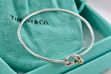 Load image into Gallery viewer, Tiffany &amp; Co. Vintage 14kt. Gold Trim &amp; Silver Love Knot Hook Bangle Bracelet
