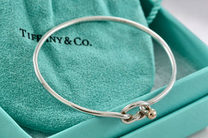 Tiffany & Co. Vintage 14kt. Gold Trim & Silver Love Knot Hook Bangle Bracelet