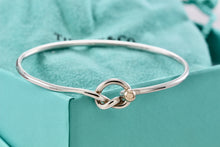 Load image into Gallery viewer, Tiffany &amp; Co. Vintage 14kt. Gold Trim &amp; Silver Love Knot Hook Bangle Bracelet
