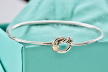 Load image into Gallery viewer, Tiffany &amp; Co. Vintage 14kt. Gold Trim &amp; Silver Love Knot Hook Bangle Bracelet
