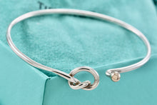 Load image into Gallery viewer, Tiffany &amp; Co. Vintage 14kt. Gold Trim &amp; Silver Love Knot Hook Bangle Bracelet
