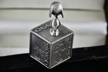 Load image into Gallery viewer, Hallmark Peanuts 5 Decades of Snoopy Cube Pewter Commemorative Figurine
