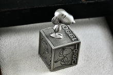 Load image into Gallery viewer, Hallmark Peanuts 5 Decades of Snoopy Cube Pewter Commemorative Figurine
