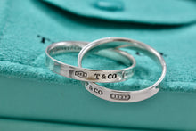 Load image into Gallery viewer, Tiffany &amp; Co. 1837 Silver Interlocking Narrow Band Rings Size 10
