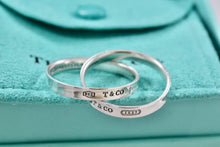 Load image into Gallery viewer, Tiffany &amp; Co. 1837 Silver Interlocking Narrow Band Rings Size 10
