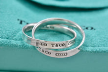 Load image into Gallery viewer, Tiffany &amp; Co. 1837 Silver Interlocking Narrow Band Rings Size 10
