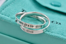 Load image into Gallery viewer, Tiffany &amp; Co. 1837 Silver Interlocking Narrow Band Rings Size 10
