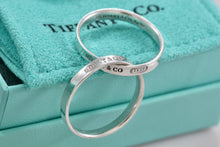 Load image into Gallery viewer, Tiffany &amp; Co. 1837 Silver Interlocking Narrow Band Rings Size 10
