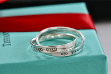 Load image into Gallery viewer, Tiffany &amp; Co. 1837 Silver Interlocking Narrow Band Rings Size 10
