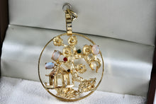 Load image into Gallery viewer, Gold Tone Enchanted Forest Moon Stone Red Garnet Round Medallion Pendant
