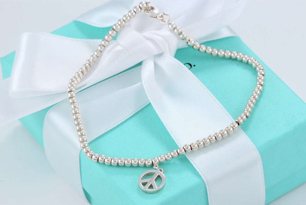 Tiffany & Co. Silver Peace Charm Mini Beaded Bracelet