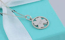 Load image into Gallery viewer, Tiffany &amp; Co. Silver Twist Clover Charm Pendant Necklace
