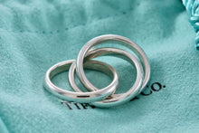 Load image into Gallery viewer, Tiffany &amp; Co. Silver Triple Interlocking Rings Size 4
