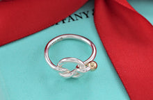 Load image into Gallery viewer, Tiffany &amp; Co. 18K Gold &amp; Silver Love Knot Hook Ring
