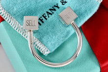 Load image into Gallery viewer, Tiffany &amp; Co. Silver BUY SELL HOLD Market Square Horseshoe Keychain Rare
