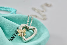 Load image into Gallery viewer, Tiffany &amp; Co. Silver &amp; 18K Gold Side Ribbon Bow Heart Pendant 16&quot; Necklace
