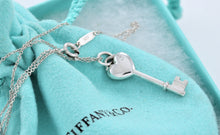 Load image into Gallery viewer, Tiffany &amp; Co. Silver Small Diamond Heart Key Pendant Necklace
